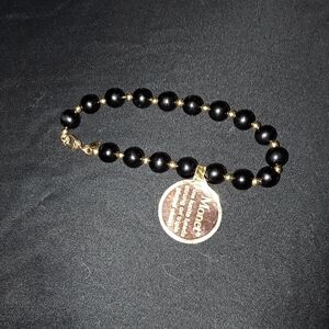 Elegant Black Beaded Bracelet with Gold Charm